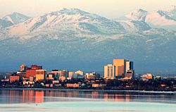 Anchorage skyline and Bootleggers Cove as photographed from Point Woronzof Park on an April evening.