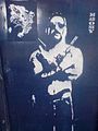 "Man with guns" graffiti.jpg