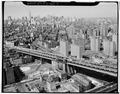VIEW OF MANHATTAN APPROACH WITH MIDTOWN IN BACKGROUND - Manhattan Bridge, Spanning East River at Flatbush Avenue, between New York City and Brooklyn, New York, New York County, HAER NY,31-NEYO,164-4.tif