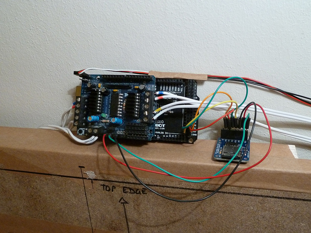 Polargraph machine - DFRduino Mega with Adafruit motorshield and micro-sd breakout.